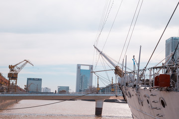 Fototapeta premium BUENOS AIRES, August 18, 2017 - Puerto Madero neighborhood, is a neighborhood of the Argentine capital in Buenos Aires, occupying a significant portion of the Rio de la Plata.
