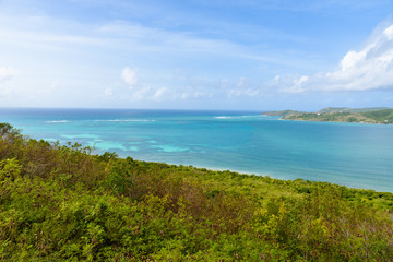 View from Shirley Heights to the coast of Antigua, paradise bay at tropical island in the Caribbean Sea