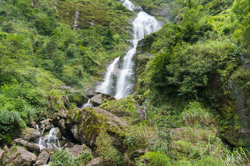 Spectacular view on waterfall in tropical forest