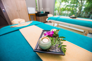 Wellness and spa concept with candles and orchid