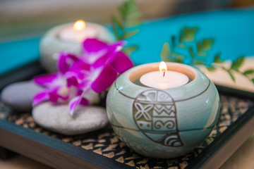 Wellness and spa concept with candles and orchid