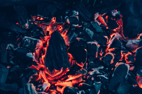 Glowing charcoal in the evening