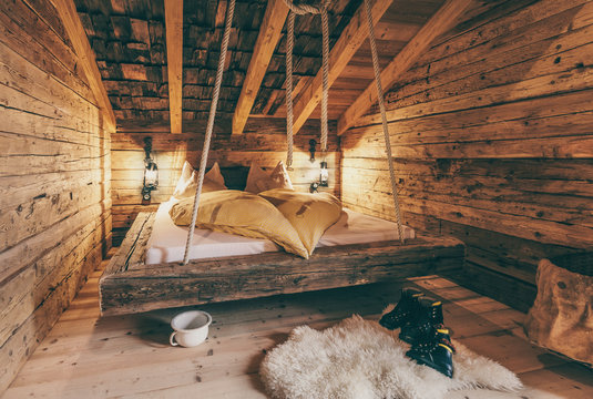 rustic sleepingroom in an old wooden alpine cabin