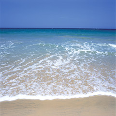 Soft wave and clear beachfront in Thailand.
