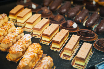 Delicious french cakes with berries and chocolate