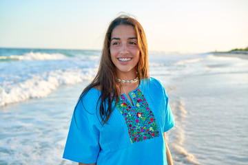 Latin beautiful girl in Caribbean beach sunset