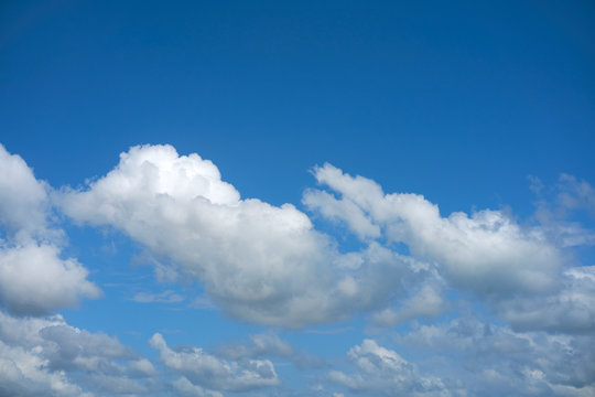 Blue summer sky white cumulus clouds