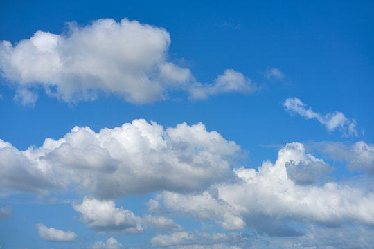 Blue summer sky white cumulus clouds