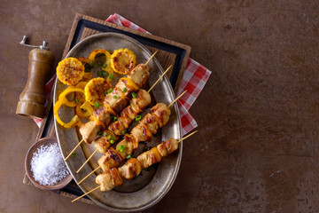 Chicken and vegetables cooked skewers