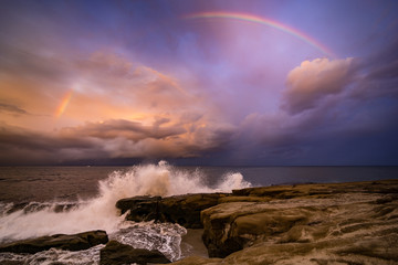 Rainbow over the waves
