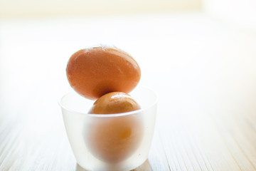 Fresh eggs in a cup