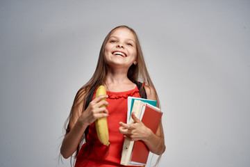 little girl laughing, banana