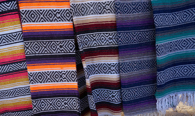 Mexican serape blanket in a row at Mexico