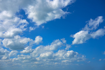 Fototapeta na wymiar Blue sky summer white cumulus clouds