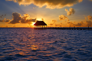 Holbox island sunset beach pier hut Mexico