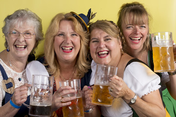 Four Ladies in Dirndls with Mug of Beer in Hand