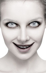 Scary female face with helloween horror grimm.