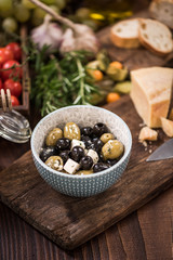 Olives and feta salad in bowl,spanish tapa bar food
