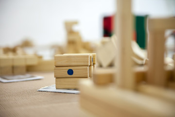  puzzles on   table in   game room.