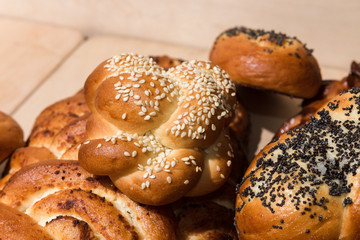 Different bakery products on a wooden background