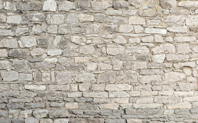 old wall with a stone