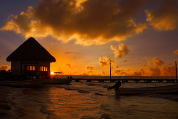 Holbox Island pier hut sunset beach in Mexico