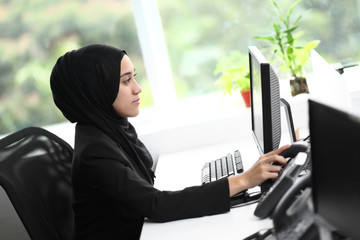 Beautiful muslim lady at work