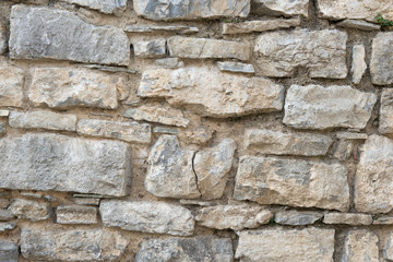 old wall with a stone