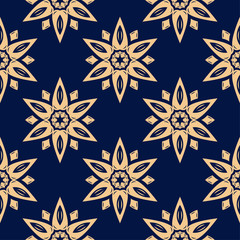 Golden floral seamless pattern on blue background
