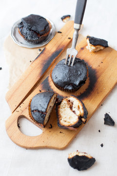burned muffins - black cupcakes, failed baking, catastrophe in the kitchen, burned on charcoal