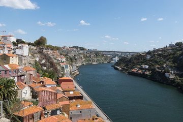 Fototapeta na wymiar Top view of Douro river and old Porto downtown, Portugal.
