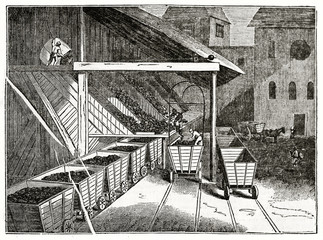 Old grayscale illustration of ancient workers screening coals next to mine carts. South Hetton colliery, United Kingdom. By unidentified author, published on  Penny Magazine, London, 1835