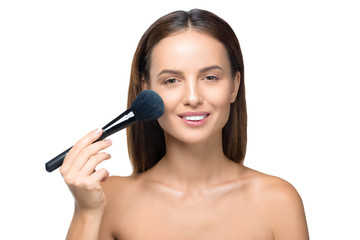 naked girl with makeup brush