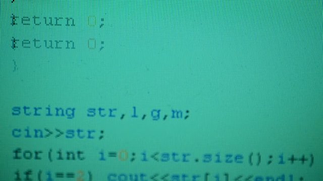 Source code on the monitor screen.