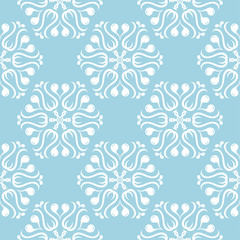 White flowers on blue background. Ornamental seamless pattern