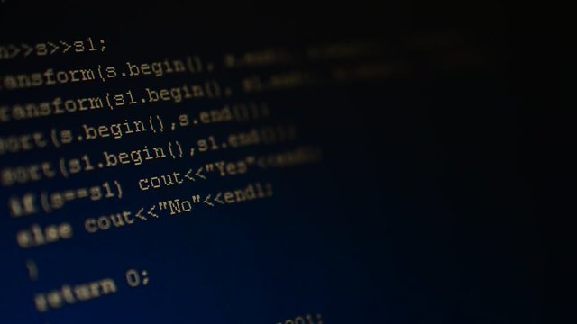 Source code on the monitor screen.