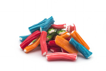 Colorful lollipops and different colored round candy