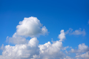 Naklejka na ściany i meble Blue sky white cumulus clouds