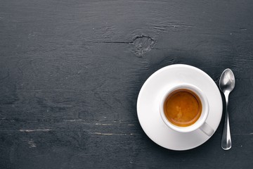 Espresso coffee On a wooden background. Top view. Free space for your text.
