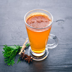 Glintvine, hot drink. On a wooden background. Top view. Free space for your text.