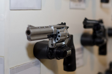 Gun wall rack with revolver