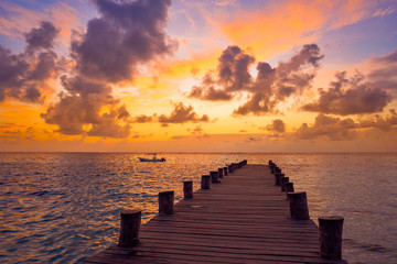 Fototapeta na wymiar Riviera Maya pier sunrise in Caribbean Mayan