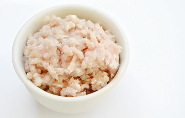 Fototapeta na wymiar raw minced pork ingredient food in cup on white background