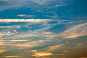 clouds in the sky at sunset as background