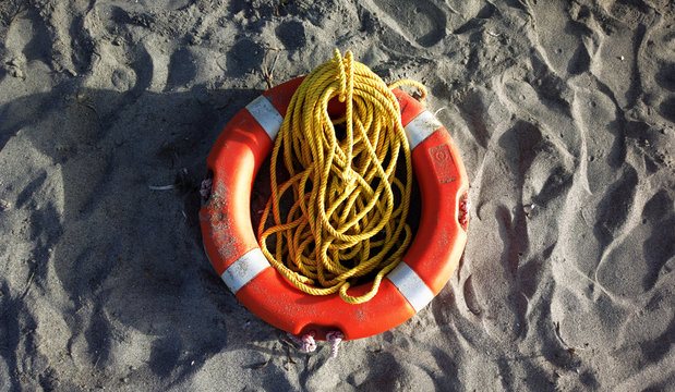 safety belt and rope on the sand beach