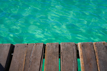 Riviera Maya Caribbean wooden pier in Mexico