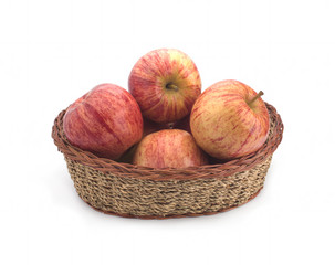 Apples in a basket on a white background