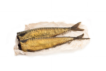 fish served with tomatoes and vegetables on big wooden board over table