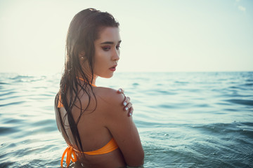Summer beach vacation holidays woman happy joyful and laughing. Summer travel getaway concept with...