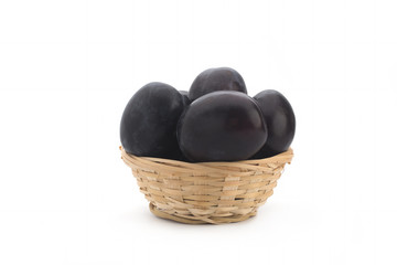 Plums on white background